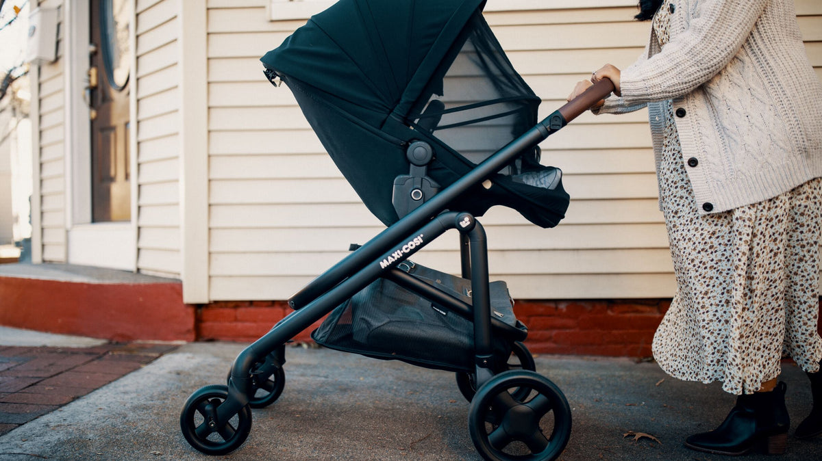 woman pushing stroller