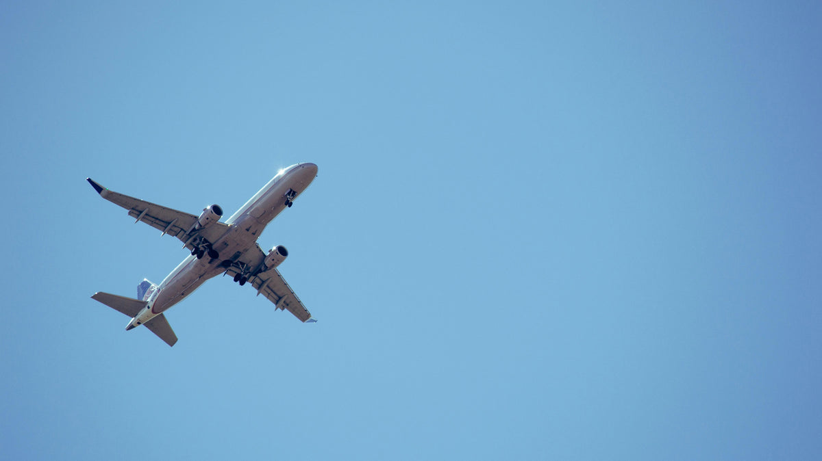 pic of airplane in blue sky