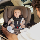 Andi 360 Rotating All-in-One Convertible Car Seat - baby being rotated in car seat