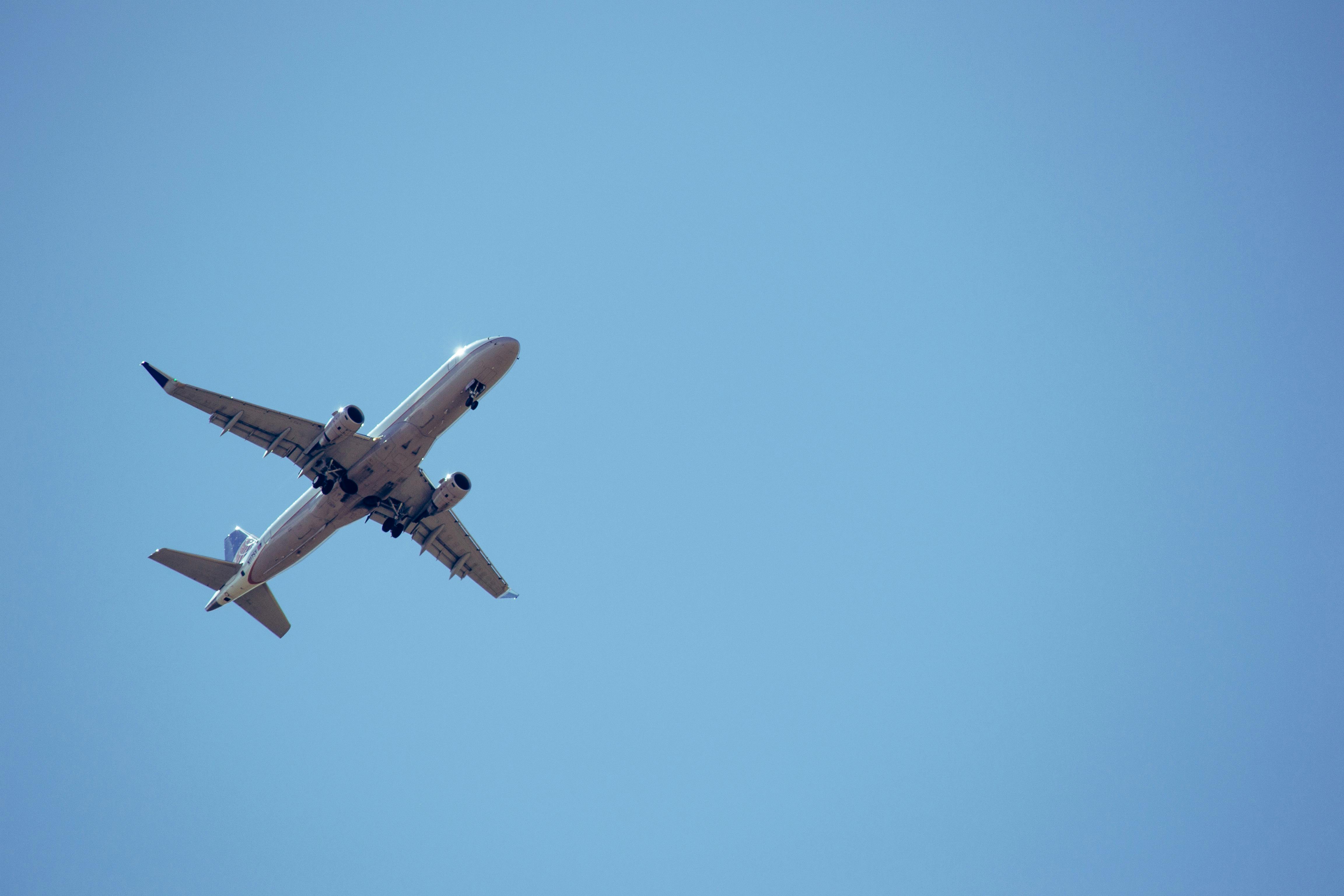 pic of airplane in blue sky