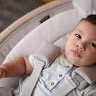 Baby lying in Cassia Swing