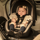 Peri™ 180° Rotating Infant Car Seat - baby rotated halfway in seat