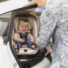 Peri™ 180° Rotating Infant Car Seat - baby rotated halfway in seat