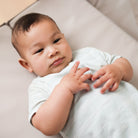 Swift Play Yard - baby lying in play yard in bassinet mode